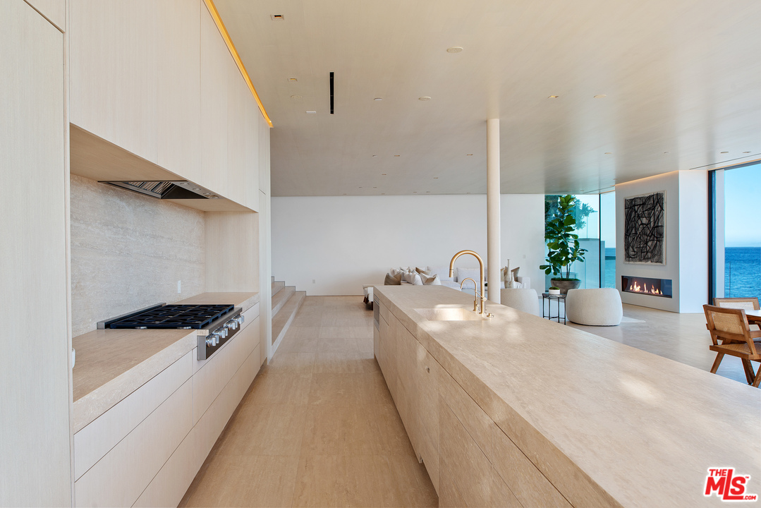 27234 Pacific Coast Highway Malibu, CA 90265 - Photo 11 of 54 a large white tub sitting in a bathroom