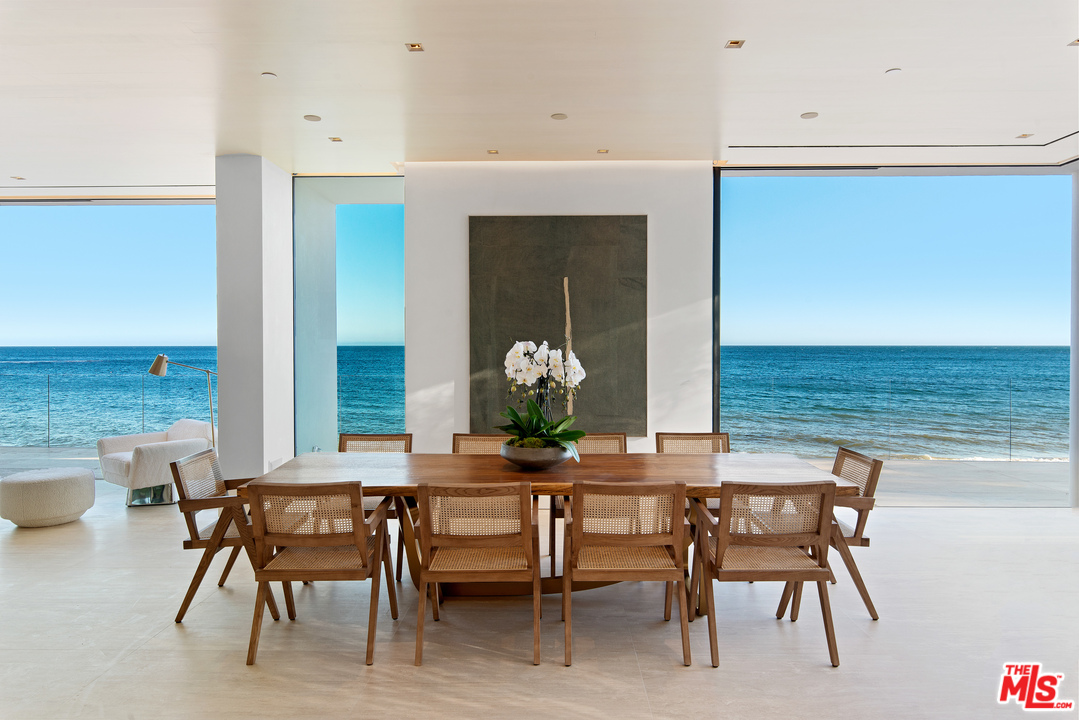 27234 Pacific Coast Highway Malibu, CA 90265 - Photo 12 of 54 a dining room with furniture and window