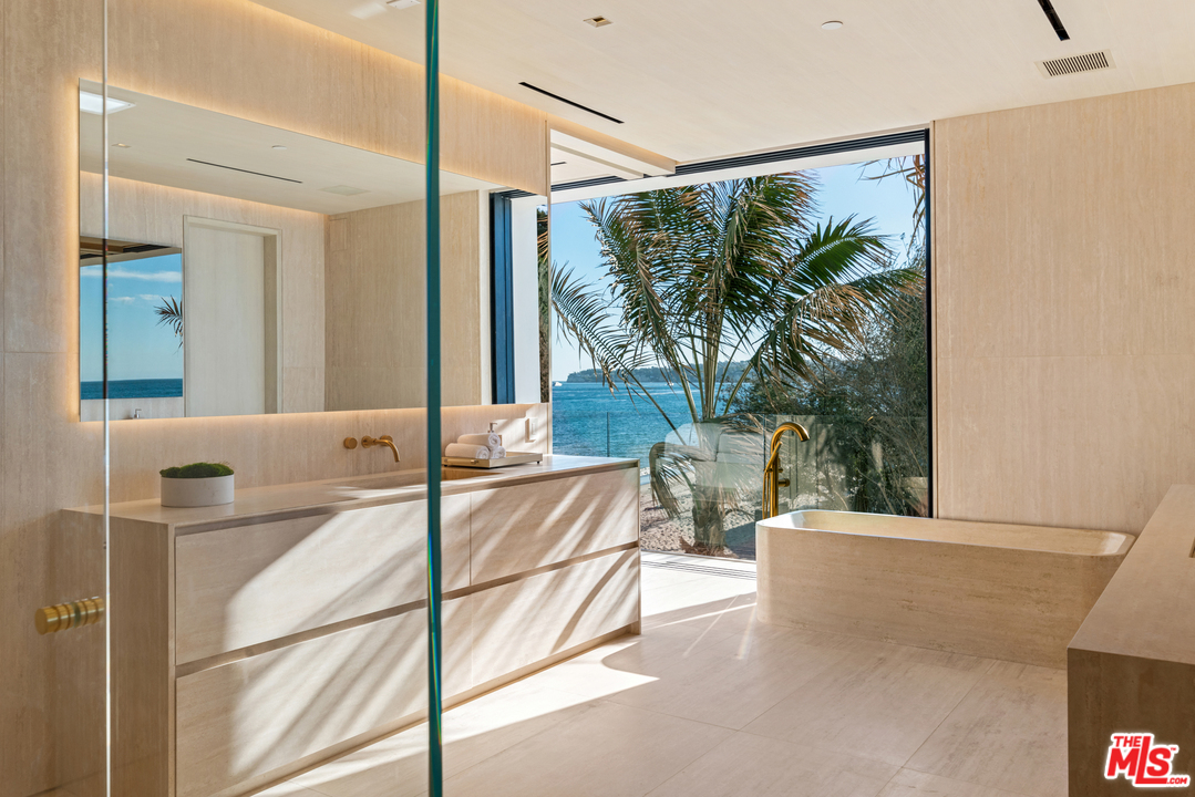 27234 Pacific Coast Highway Malibu, CA 90265 - Photo 27 of 54 a view of a living room and a balcony