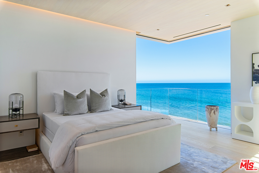 27234 Pacific Coast Highway Malibu, CA 90265 - Photo 32 of 54 a bed room with a bed