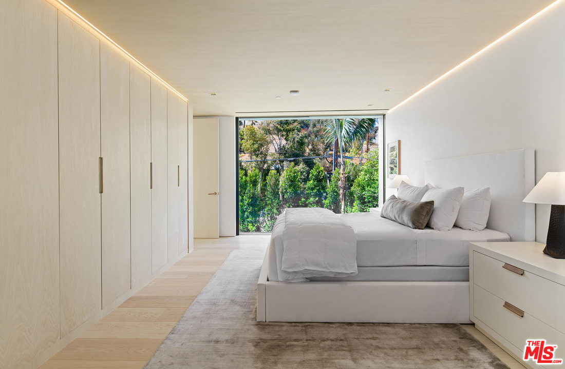27234 Pacific Coast Highway Malibu, CA 90265 - Photo 34 of 54 a living room with furniture and a large window