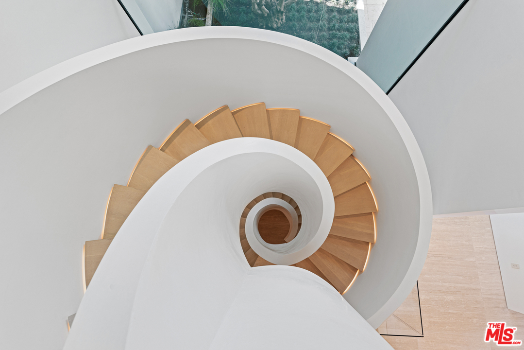 27234 Pacific Coast Highway Malibu, CA 90265 - Photo 35 of 54 a utility room with dryer and washer