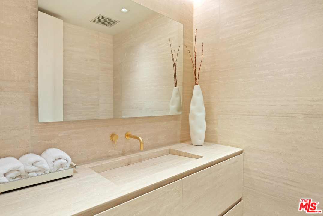 27234 Pacific Coast Highway Malibu, CA 90265 - Photo 42 of 54 a bathroom with a sink and a mirror