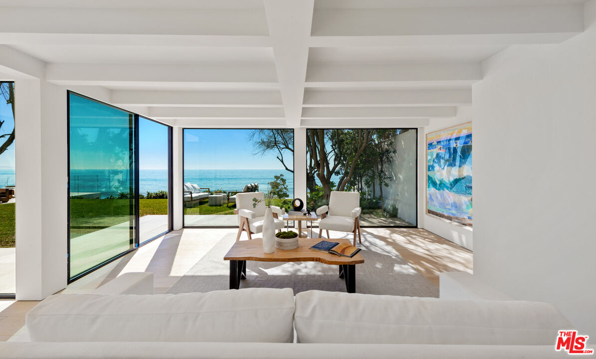27234 Pacific Coast Highway Malibu, CA 90265 - Photo 46 of 54 a living room with couch and a large window