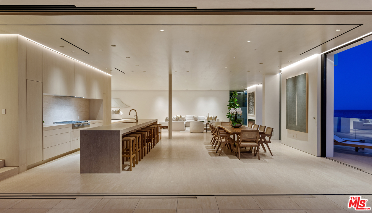 27234 Pacific Coast Highway Malibu, CA 90265 - Photo 50 of 54 a living room with stainless steel appliances granite countertop furniture and a kitchen view