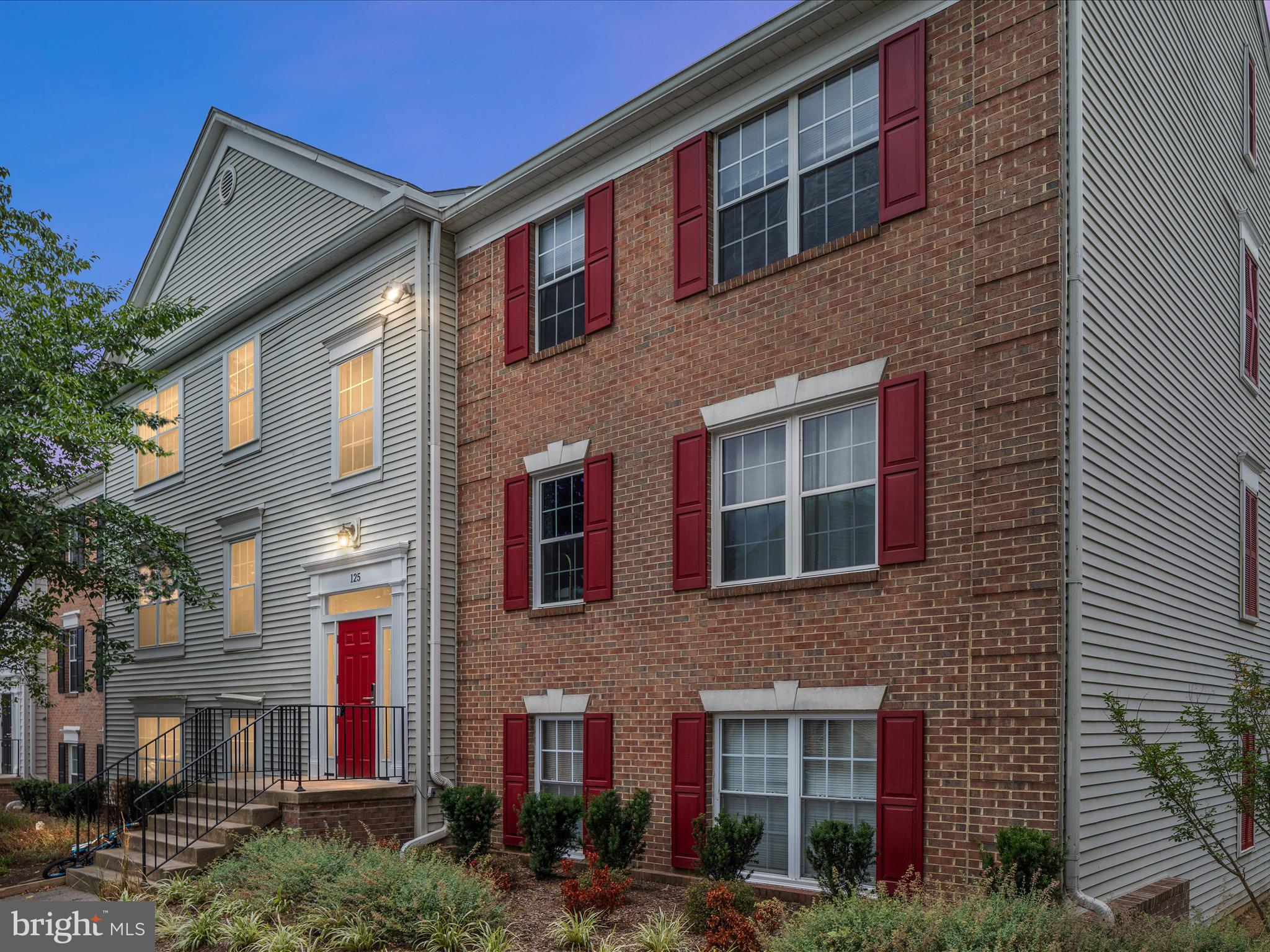 125 Fort Evans Road Southeast, Unit F Leesburg, VA 20175 - Photo 1 of 19 TWILIGHT_BY1A1762(125)_125 Fort Evans Rd SE - Abso