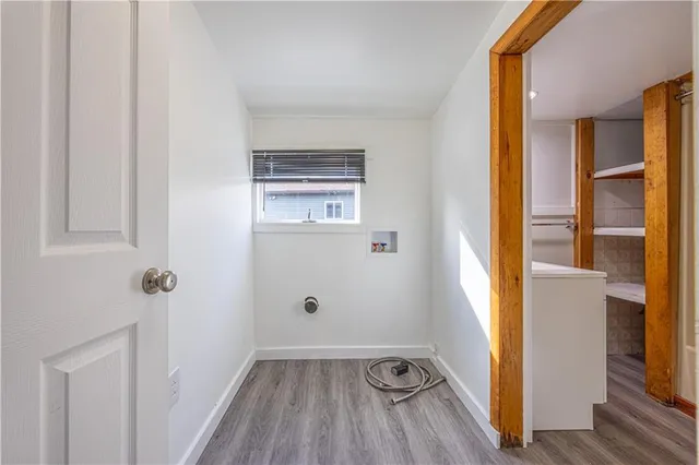 a view of bathroom with a sink and mirror