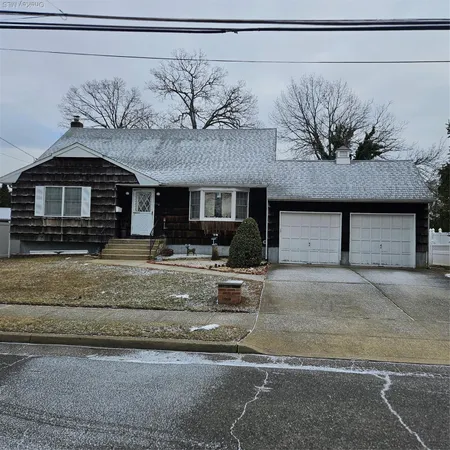 a view of a house with a street