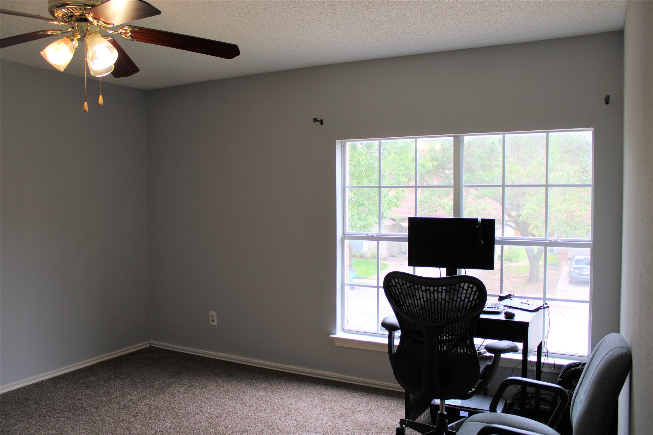 16205 Glorious Lane Pflugerville, TX 78660 - Photo 22 of 30 a view of workspace with furniture and window