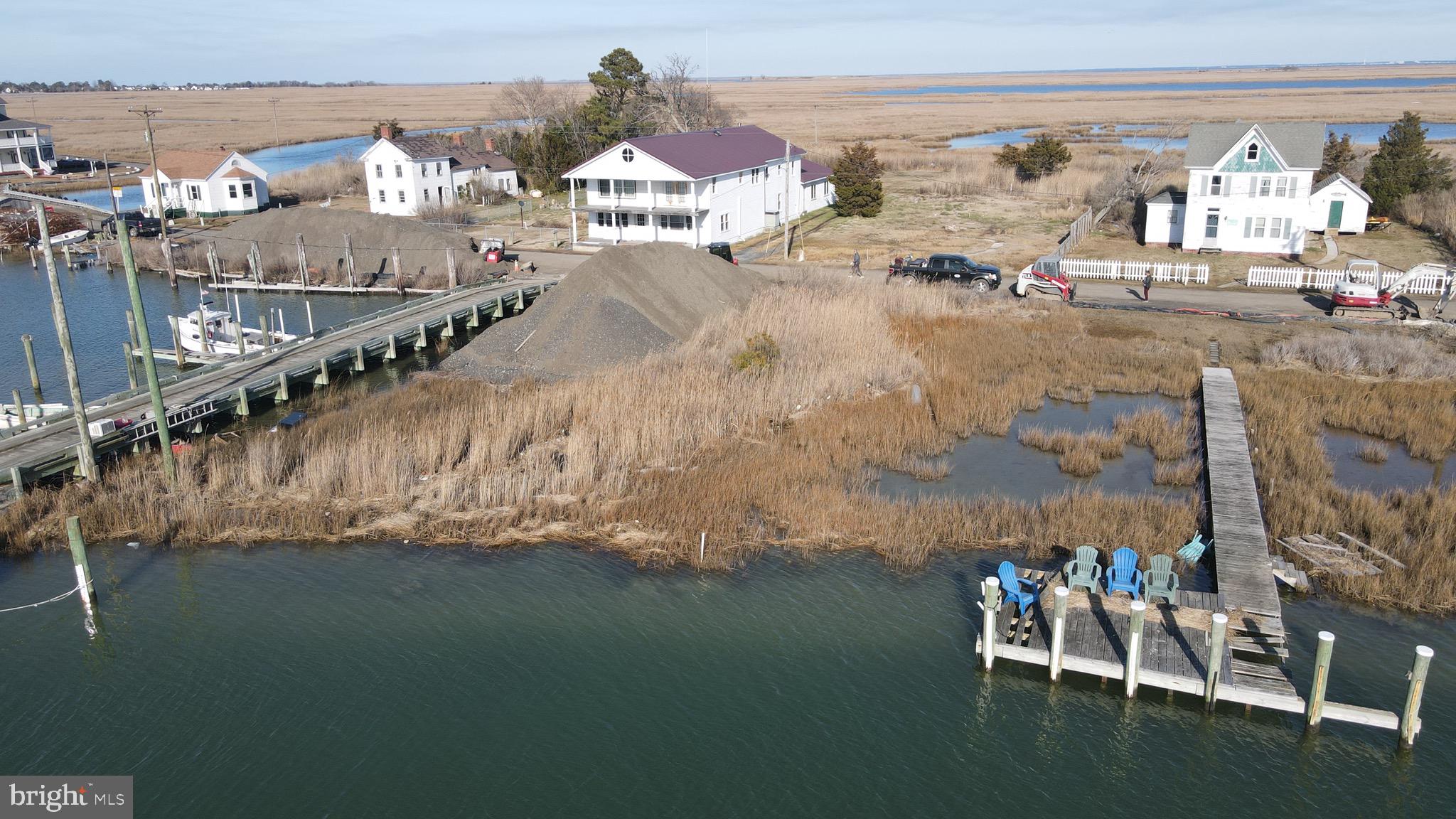 3336 Marsh Road Ewell, MD 21824 - Photo 6 of 42 a view of swimming pool with outdoor seating