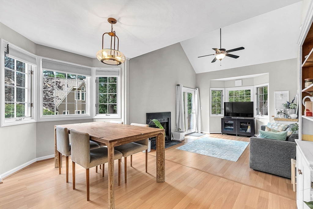 5 Weybridge Lane, Unit 5 Hopkinton, MA 01748 - Photo 3 of 34 a view of a livingroom with furniture window and wooden floor