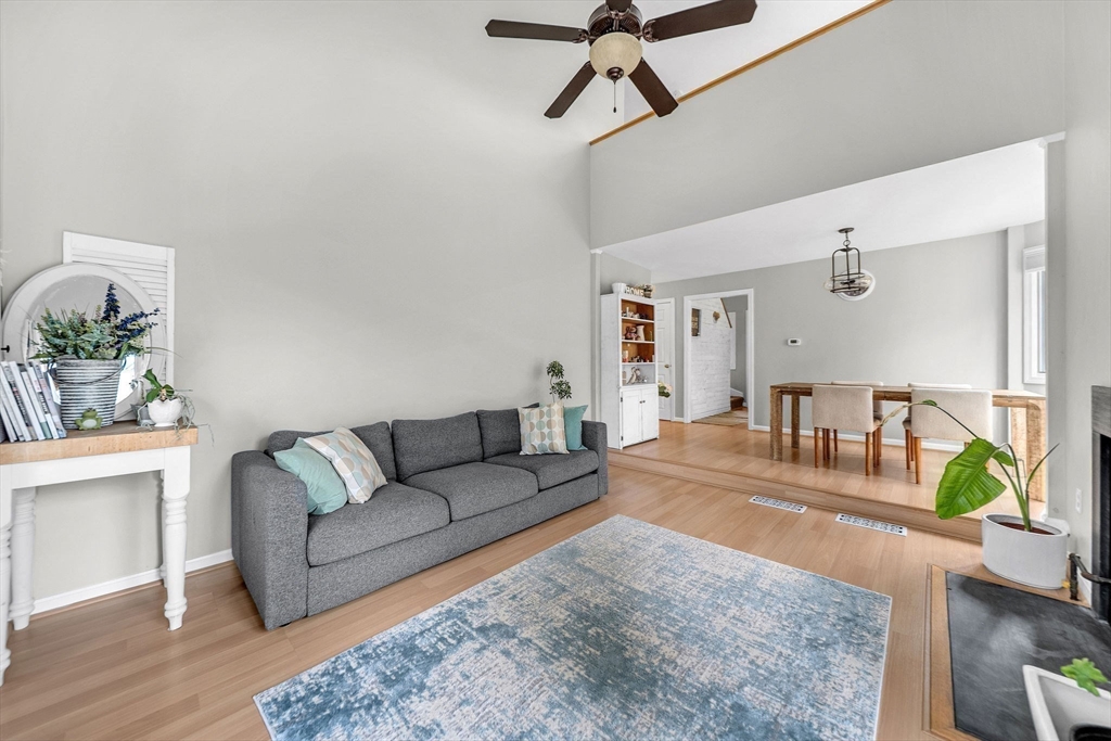 5 Weybridge Lane, Unit 5 Hopkinton, MA 01748 - Photo 4 of 34 a living room with furniture