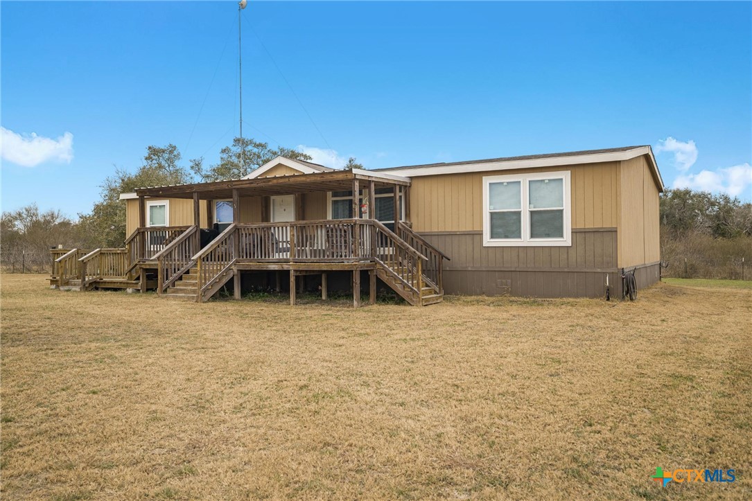 2610 Wendel Road Meyersville, TX 77974 - Photo 25 of 29 a front view of a house with a yard