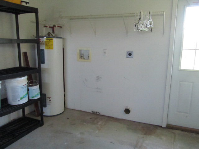 8781 Shannon's Mill Road Foley, AL 36535 - Photo 17 of 17 Garage w/ Laundry
