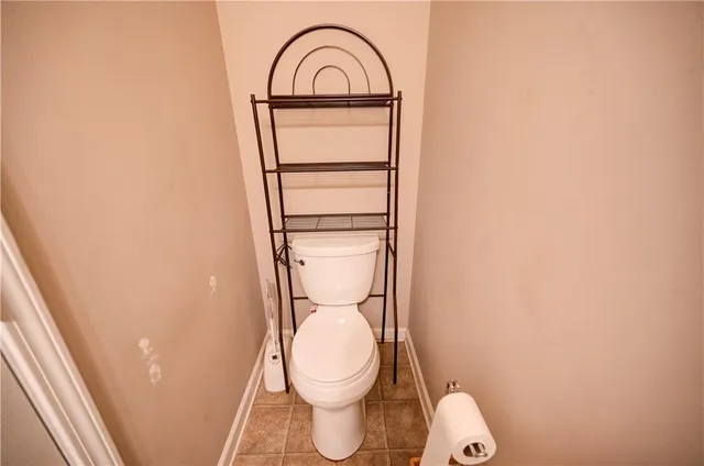 a bathroom with a toilet