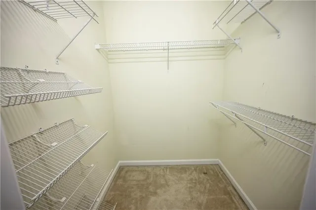 a view of a room with racks on the wall