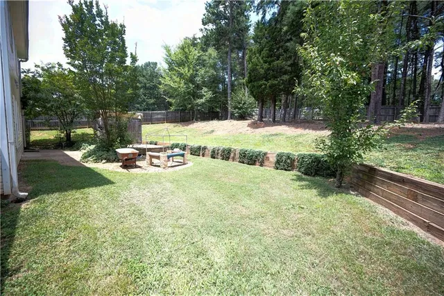 a view of backyard with green space
