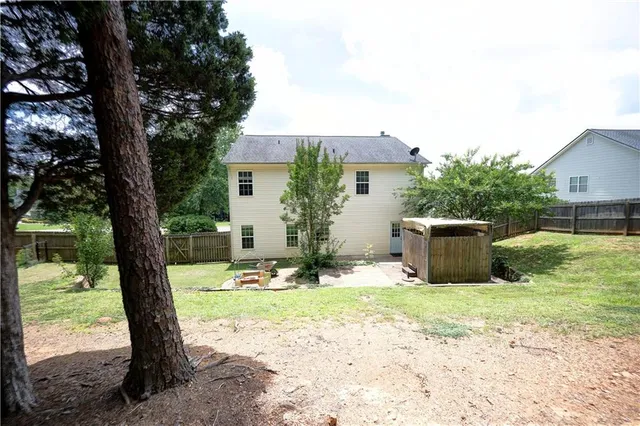 a view of outdoor space with lots of trees