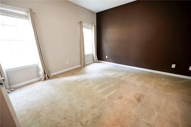 an empty room with windows