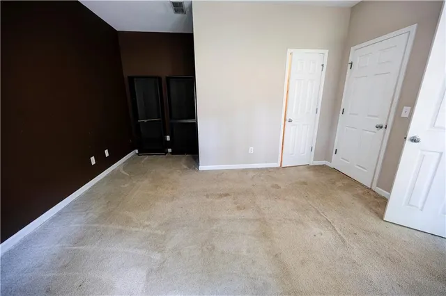 an empty room with closet