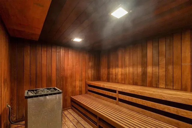 a view of room with wooden walls