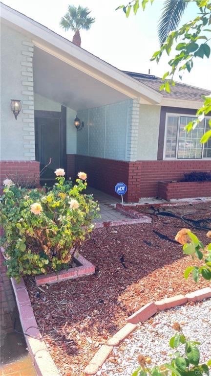 14515 Rivers Edge Road Helendale, CA 92342 - Photo 16 of 16 a view of a backyard with a potted plants