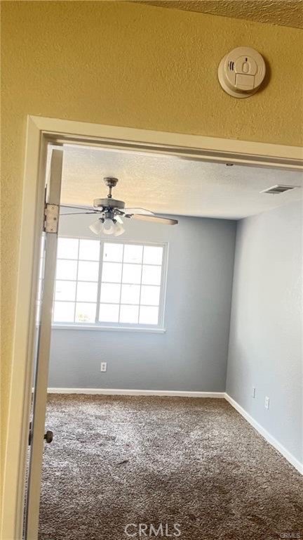 14515 Rivers Edge Road Helendale, CA 92342 - Photo 5 of 16 a view of empty room with window