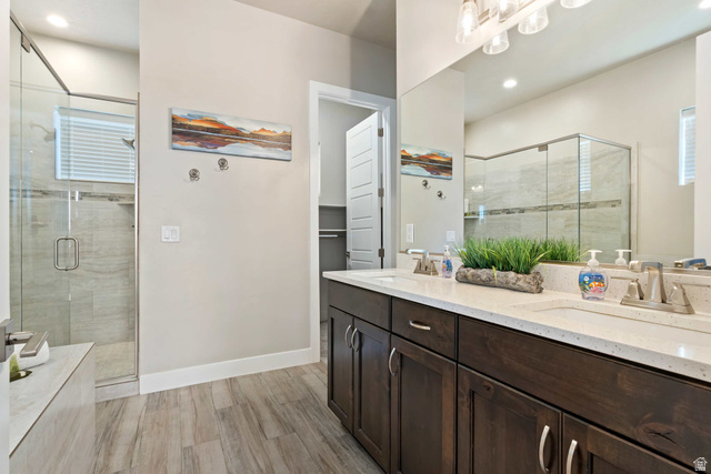 2600 Ocotillo Way, Unit 31 Santa Clara, UT 84765 - Photo 18 of 73 Bathroom featuring a dual vanity with dark wood cabinetry and light-toned countertops