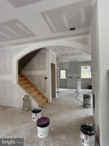 a view of a livingroom and a staircase
