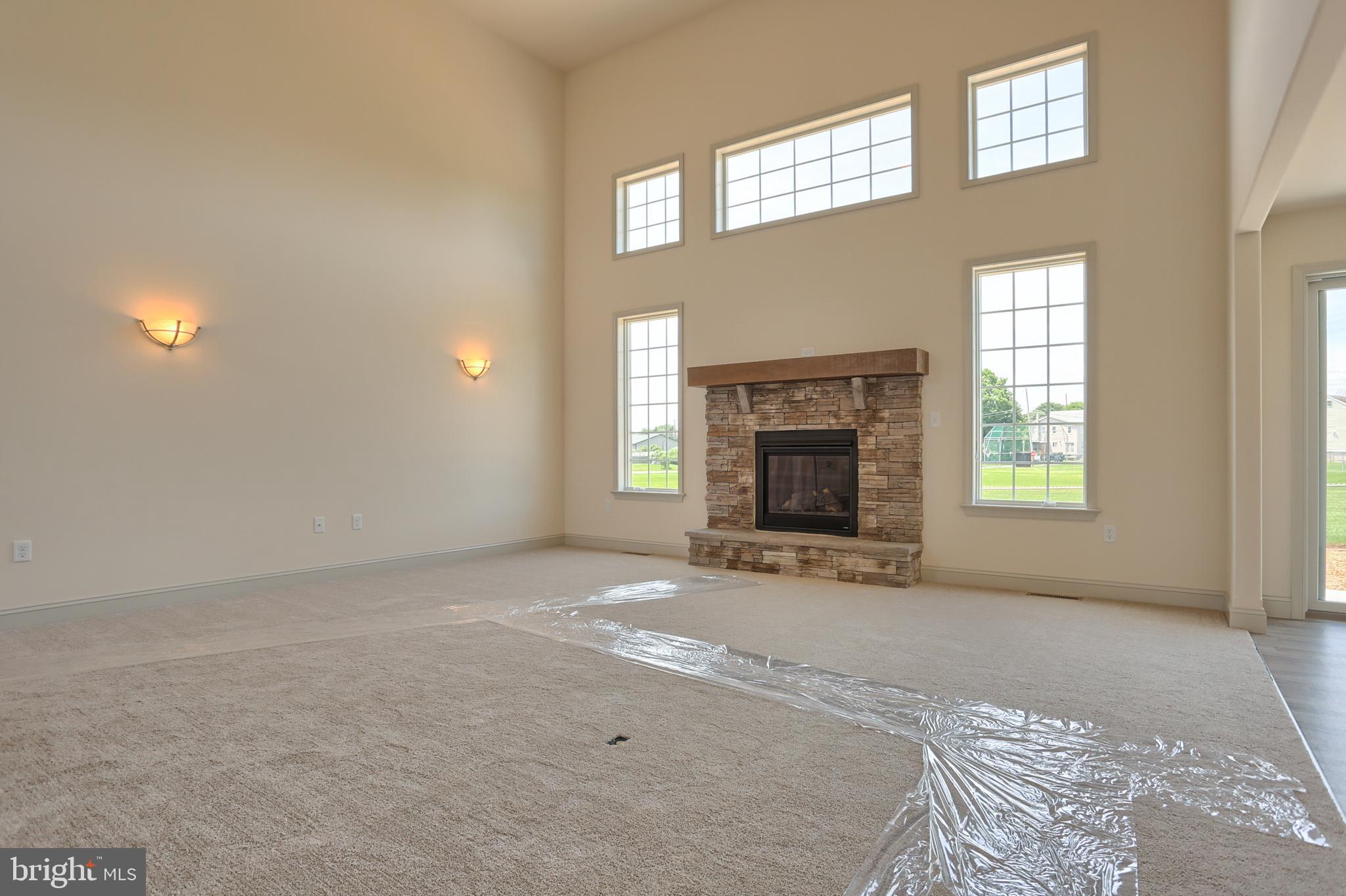17 Rolling Meadow Road Lebanon, PA 17046 - Photo 11 of 41 a view of an empty room with a fireplace and a window