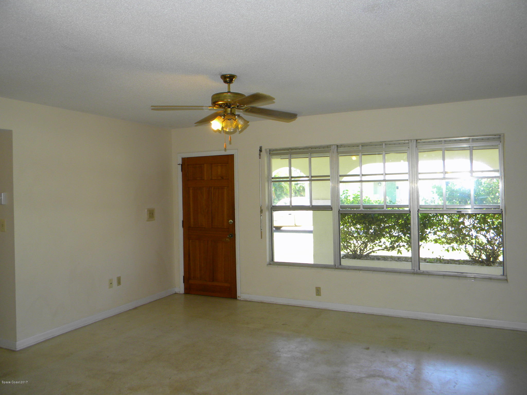 822 Angle Street Northeast Palm Bay, FL 32905 - Photo 4 of 13 Living Room View 2