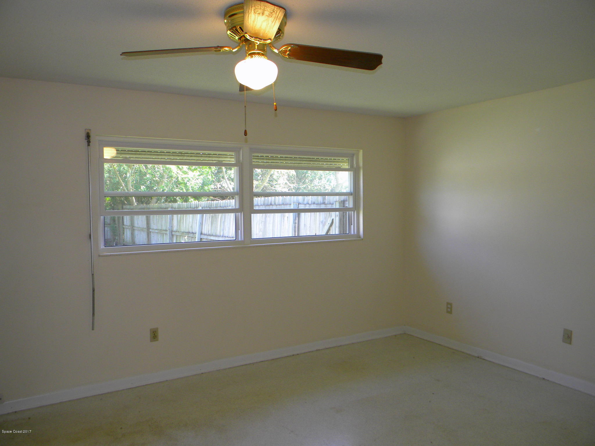 822 Angle Street Northeast Palm Bay, FL 32905 - Photo 7 of 13 Master Bedroom