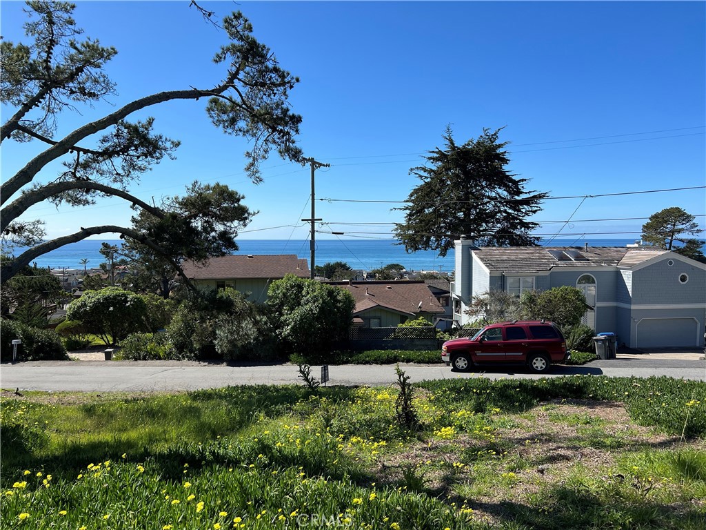 1970 Emmons Road Cambria, CA 93428 - Photo 6 of 16 a front view of a house with a yard