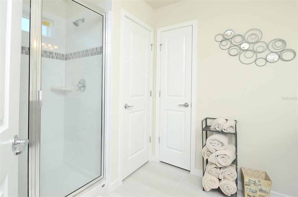 4963 Royal Point Avenue Kissimmee, FL 34746 - Photo 17 of 27 a bathroom with a shower