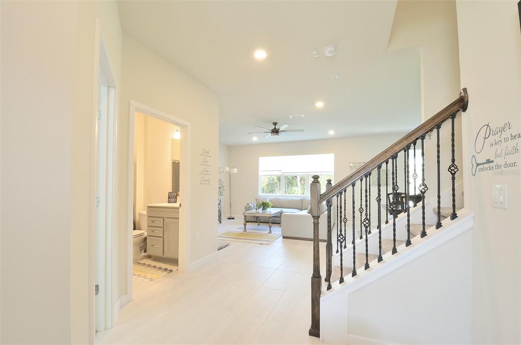 4963 Royal Point Avenue Kissimmee, FL 34746 - Photo 5 of 27 a view of entryway and hall with a living room