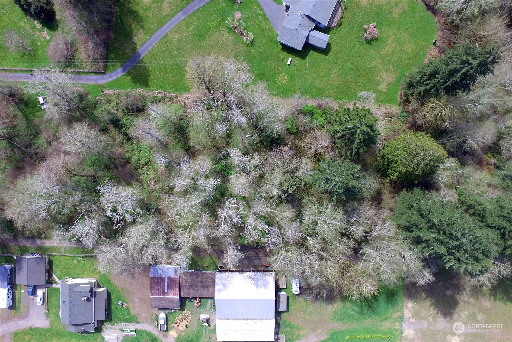 1 Bethel Burley Road Southeast Port Orchard, WA 98367 - Photo 14 of 26 an aerial view of a house with a yard
