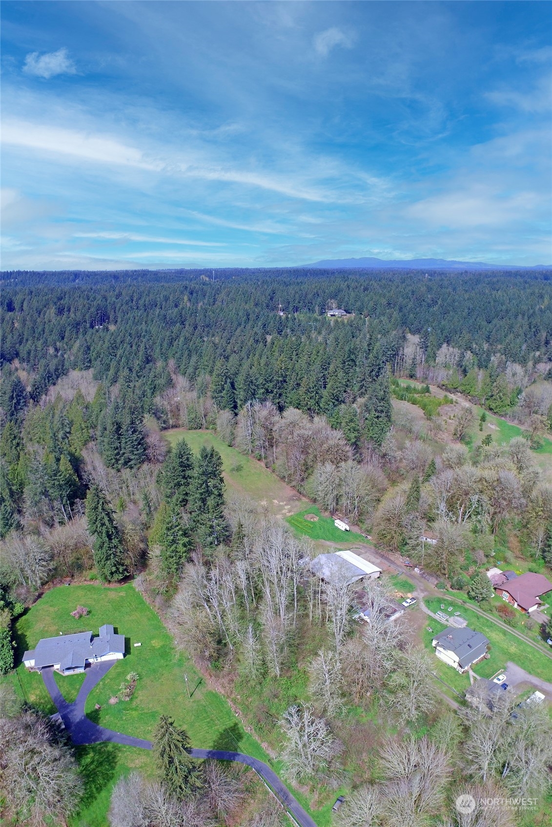 1 Bethel Burley Road Southeast Port Orchard, WA 98367 - Photo 20 of 26 a view of a yard with an outdoor space