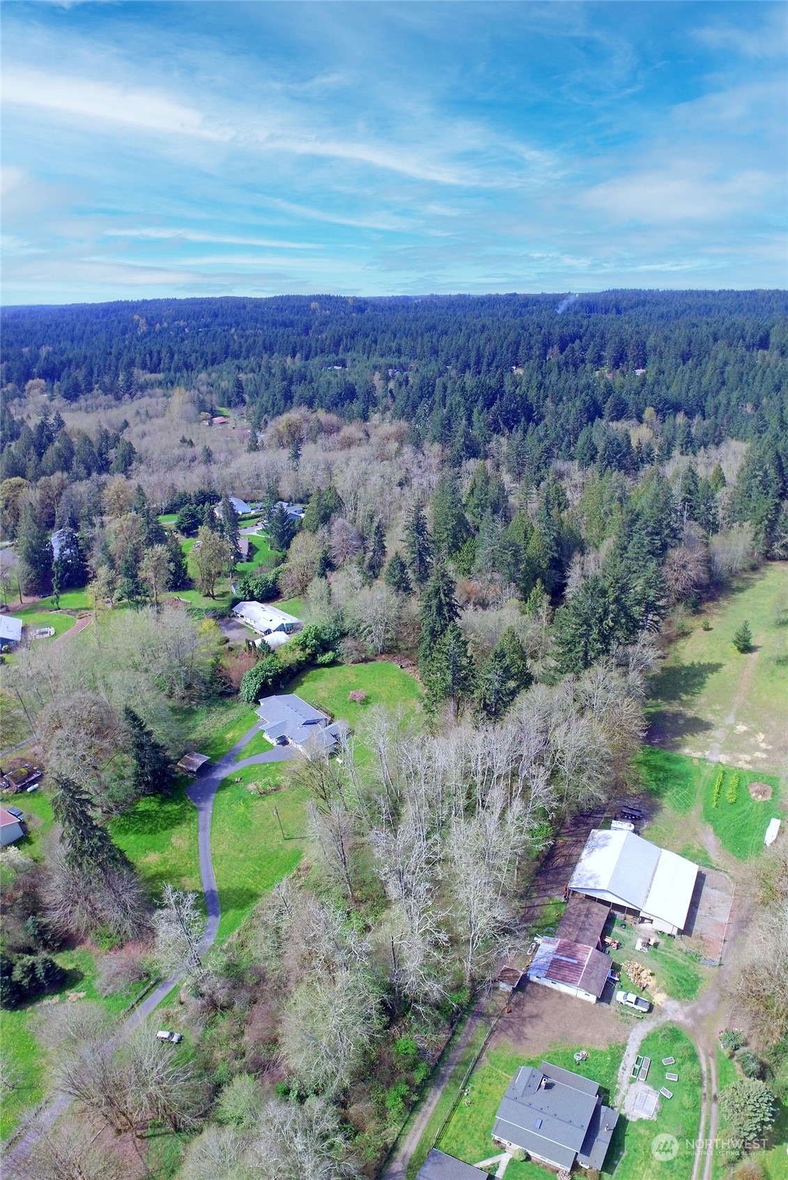 1 Bethel Burley Road Southeast Port Orchard, WA 98367 - Photo 21 of 26 an aerial view of a house with a yard