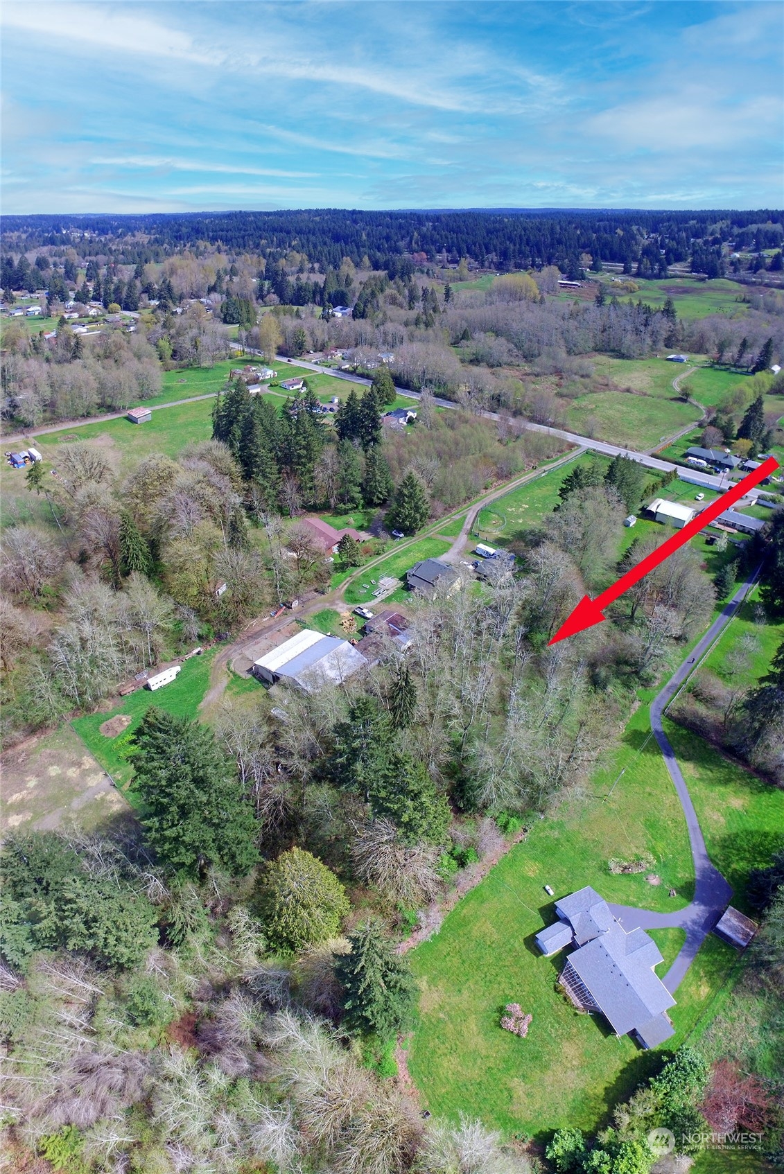 1 Bethel Burley Road Southeast Port Orchard, WA 98367 - Photo 24 of 26 a view of a city with lots of trees