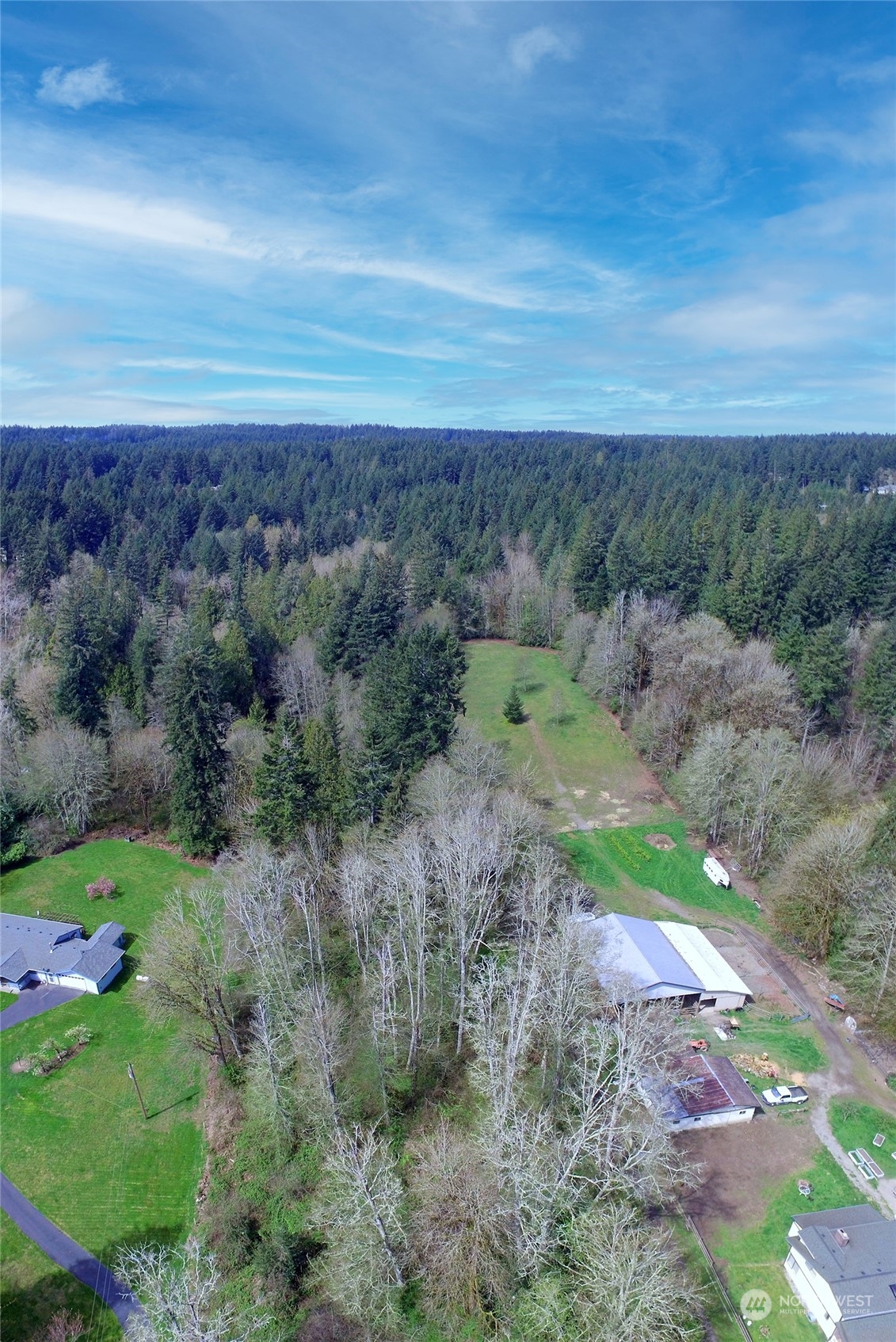 1 Bethel Burley Road Southeast Port Orchard, WA 98367 - Photo 25 of 26 a view of a field with an ocean
