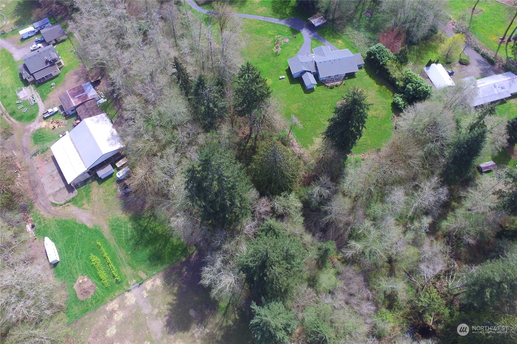 1 Bethel Burley Road Southeast Port Orchard, WA 98367 - Photo 8 of 26 an aerial view of a house with a yard