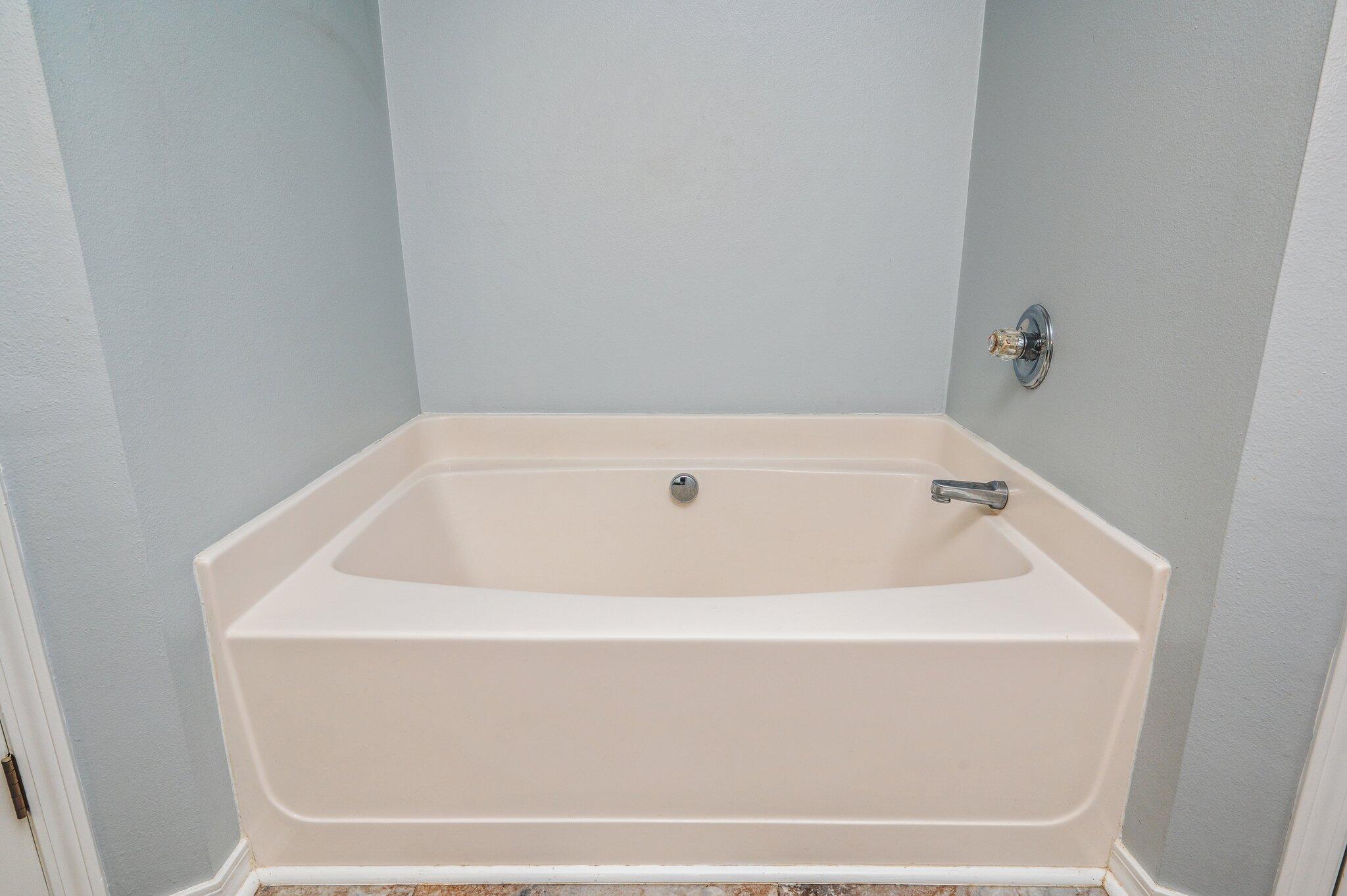 459 Jillian Drive Crestview, FL 32536 - Photo 29 of 46 a white bath tub sitting in a bathroom