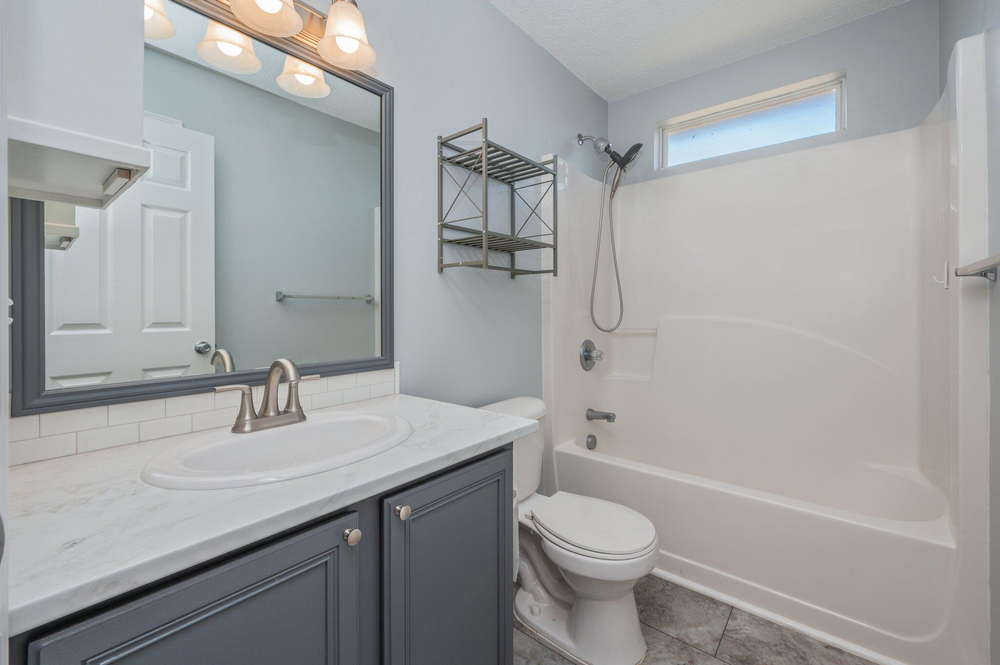 459 Jillian Drive Crestview, FL 32536 - Photo 37 of 46 a bathroom with a sink a toilet and shower