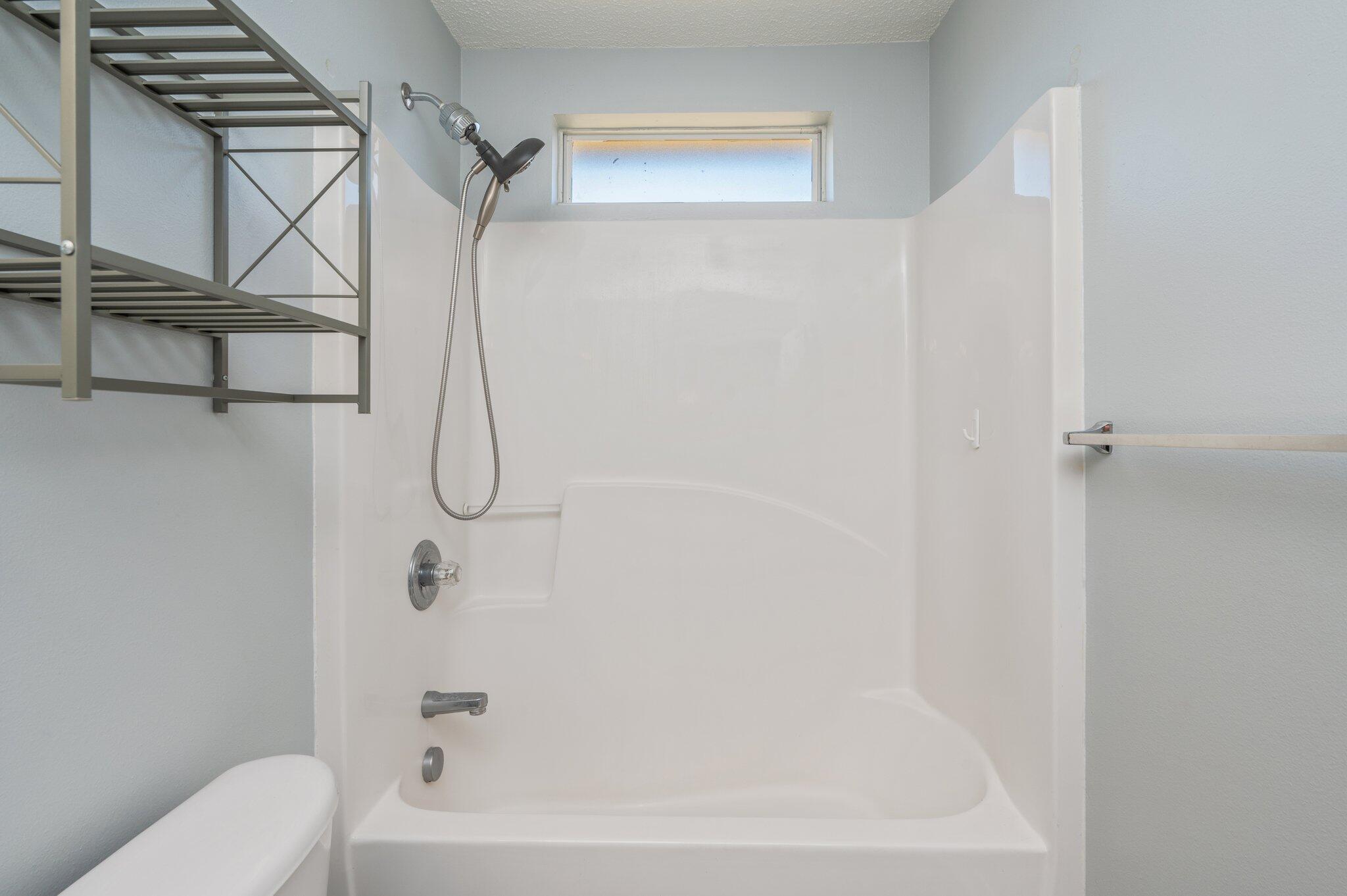 459 Jillian Drive Crestview, FL 32536 - Photo 38 of 46 a bathroom with a bath tub with a shower