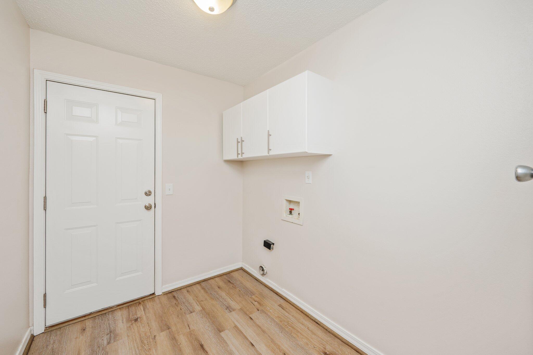 459 Jillian Drive Crestview, FL 32536 - Photo 40 of 46 a view of an empty room with wooden floor