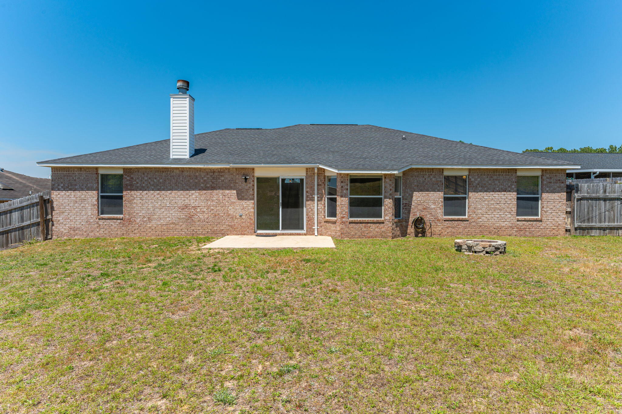 459 Jillian Drive Crestview, FL 32536 - Photo 45 of 46 a front view of a house with swimming pool