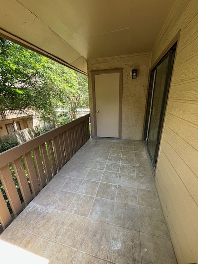 5001 Lamonte Lane, Unit 116 Houston, TX 77092 - Photo 21 of 25 a view of a porch