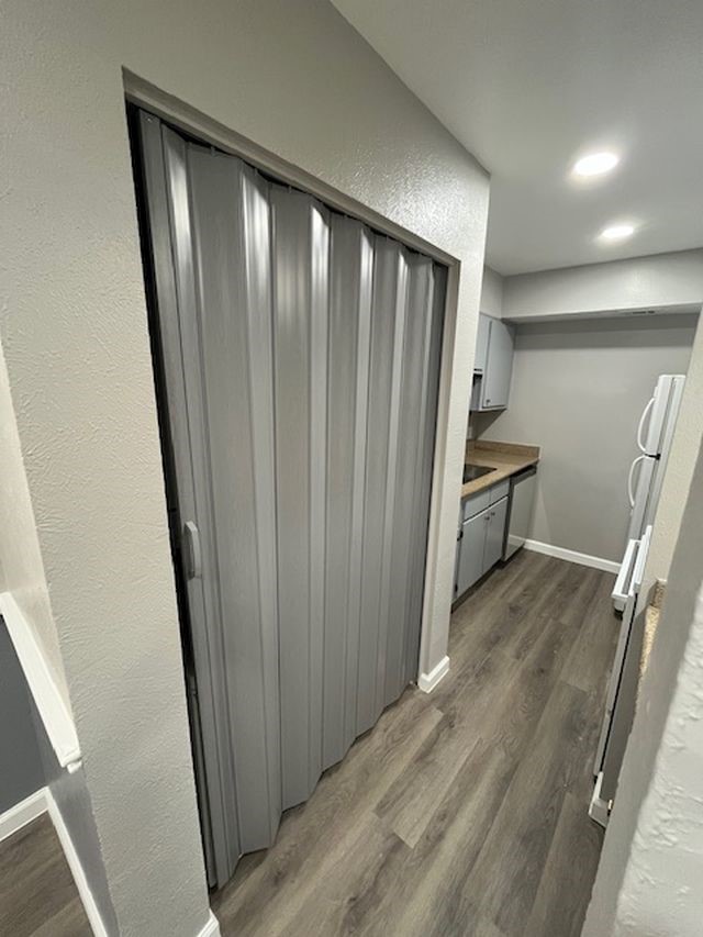 5001 Lamonte Lane, Unit 116 Houston, TX 77092 - Photo 8 of 25 a view of entryway with wooden floor