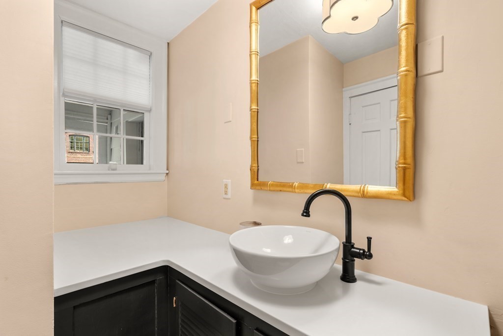 176 Dorset Road Newton, MA 02468 - Photo 12 of 27 a bathroom with a sink and a bathtub