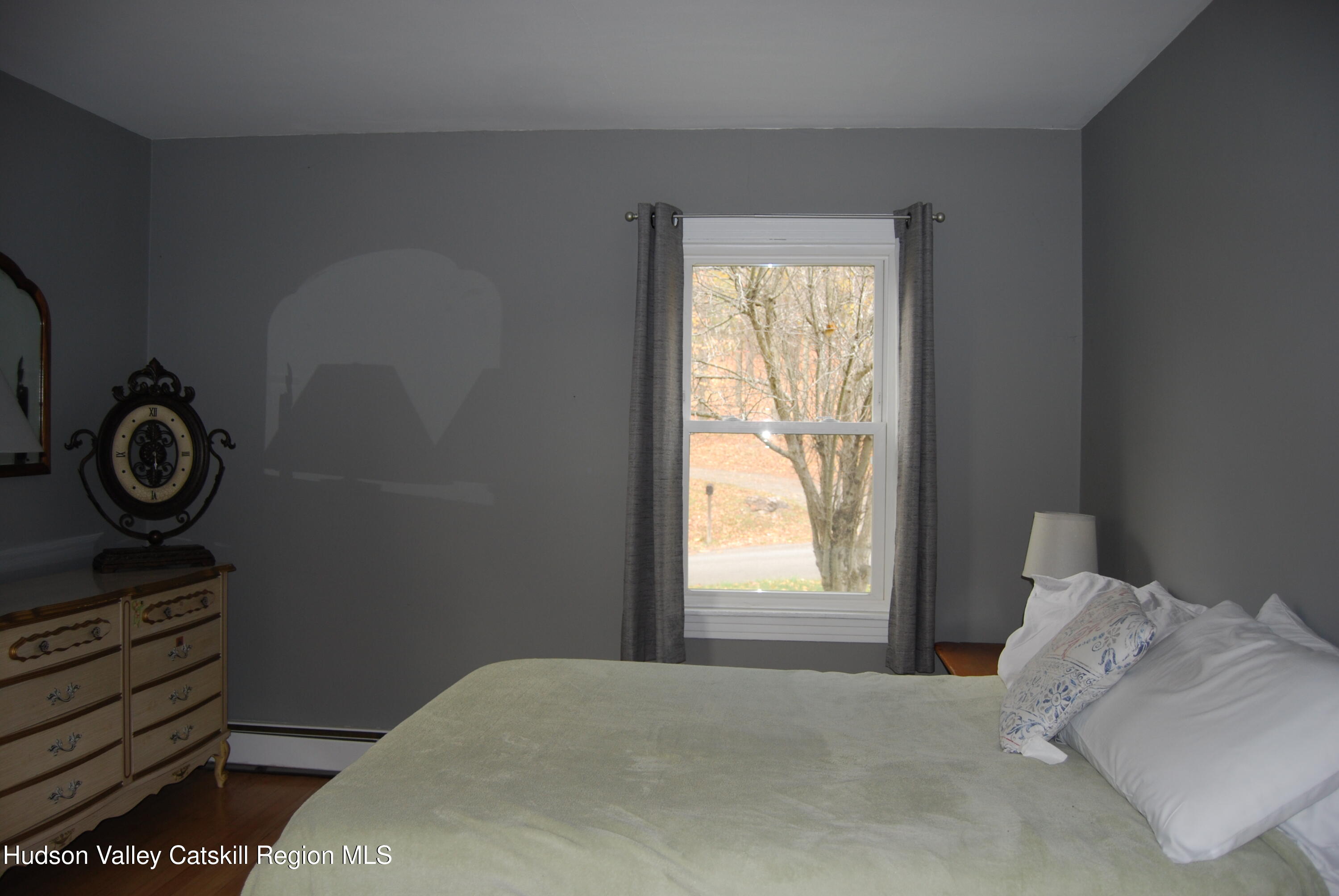7 Harmon Heights Road Chatham, NY 12037 - Photo 11 of 25 a view of bedroom with a bed and a window